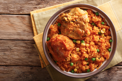 Brazilian galinhada made with saffron rice and chicken thighs