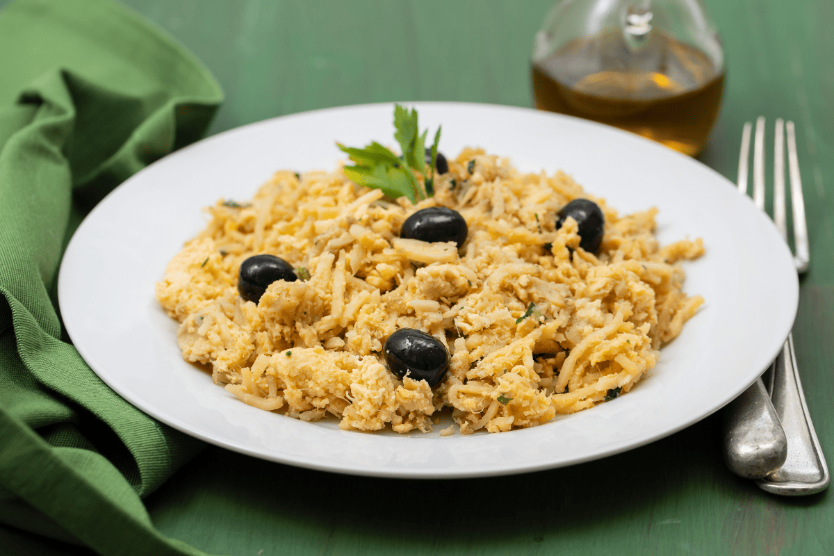 plate of bacalhau a bras, a Brazilian dish made with egg and salt cod